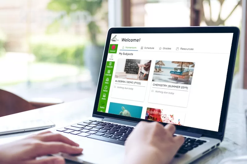 Image of a user using a laptopto access VTVLC Canvas.