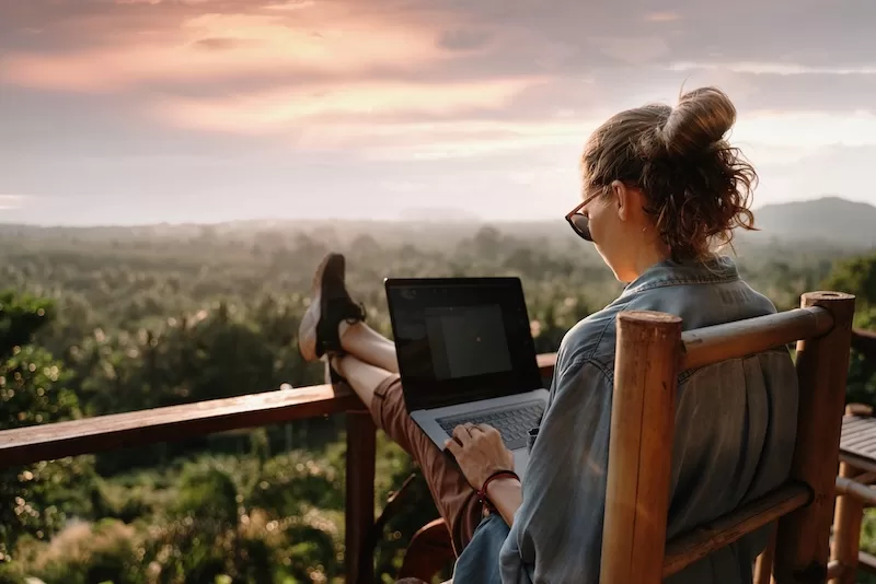 smiling student participating in an online class